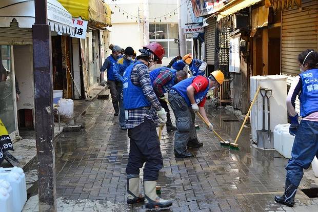 Paul and colleagues cleaning the Ishinomaki streets in April, 2011